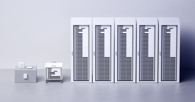Meter networking equipment arranged alongside five white server cabinets.